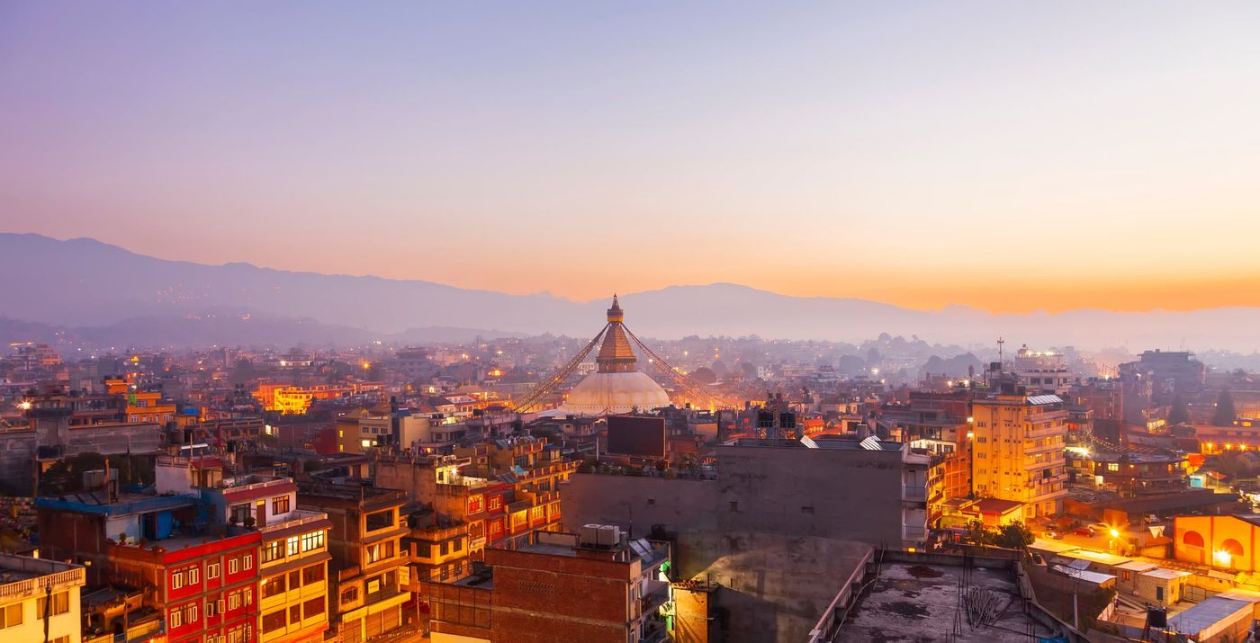 Sunset,At,The,Boudhanath,Stupa,Kathmandu,Nepal.colorful,Panorama,Cityscape,In